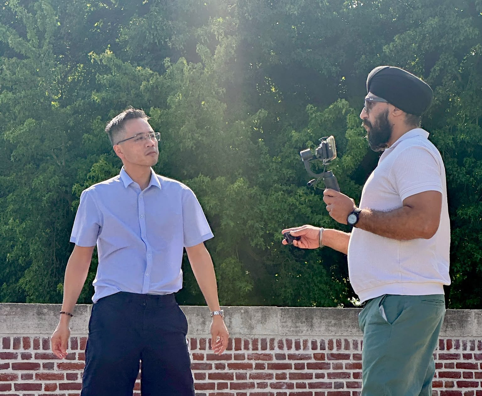 Jay filming a clip with Cllr Alex Yip
Credit: Manpreet Kaur Maycock