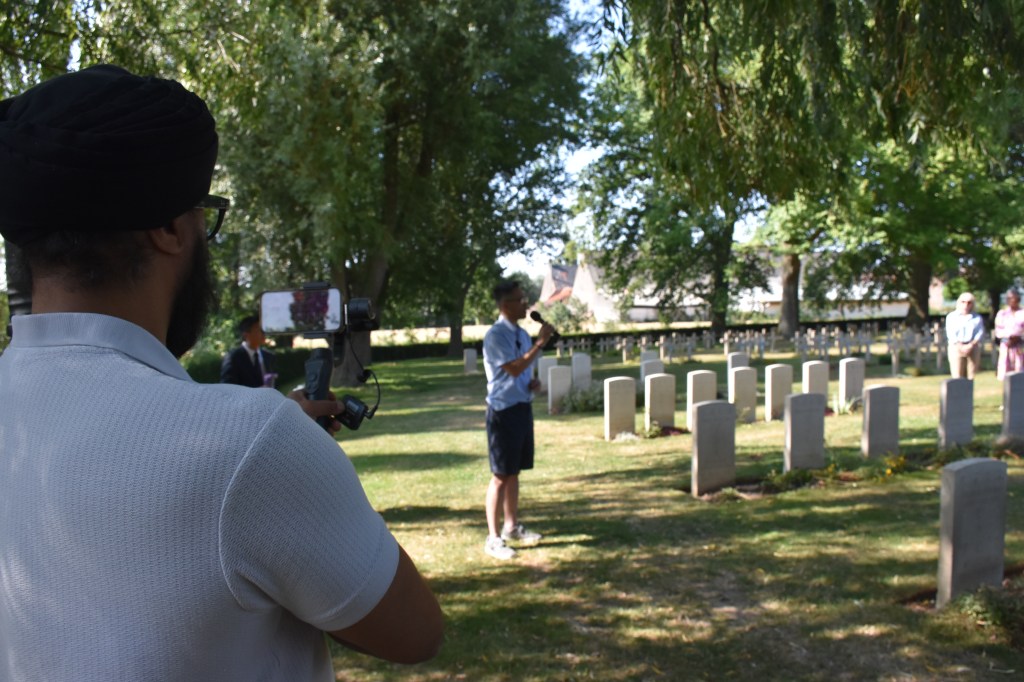 Jay filming at the Lijssenthoek Military Cemetery
Credit: Manpreet Kaur Maycock