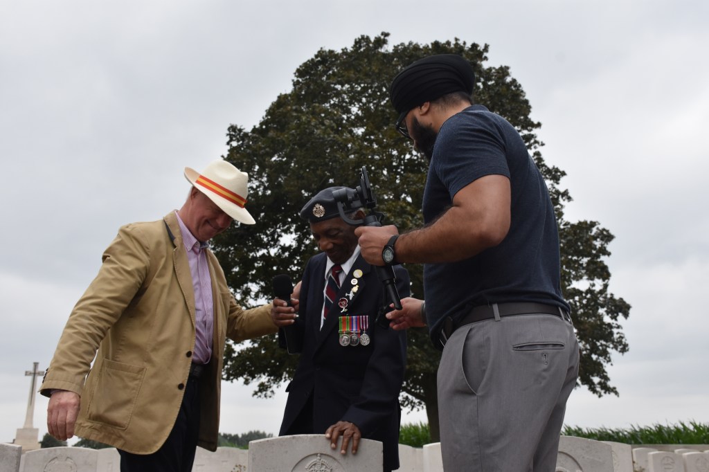 Jay assisting 101 year old veteran Prince Albert Jacob
Credit: Manpreet Kaur Maycock
