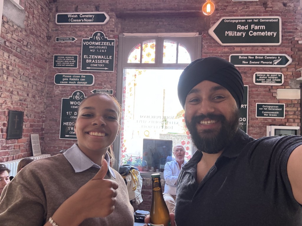 Jay meets staff at the Commonwealth War Graves Cafe opposite the Menin Gate